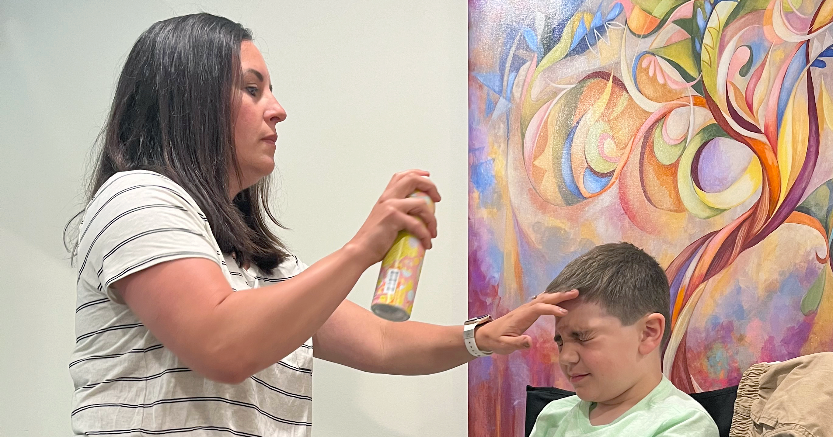 Hair and Make-up Artist Andrea Vieth prepares talent for on camera action.