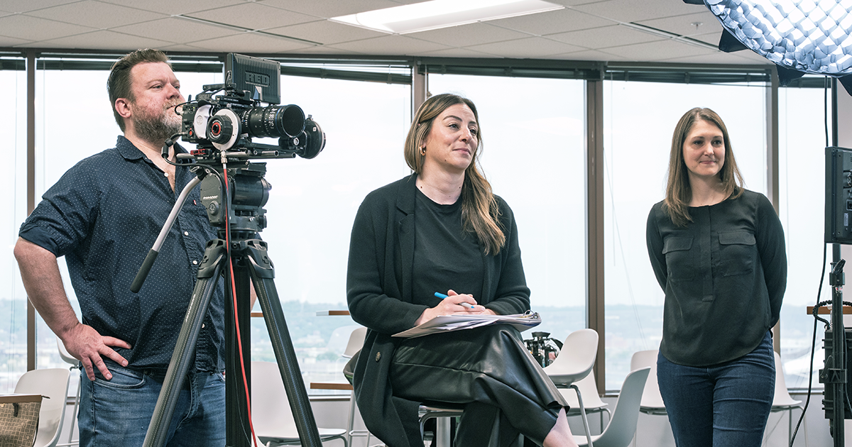 Fractional Video Marketing Team on set with clinical research client shooting interviews.